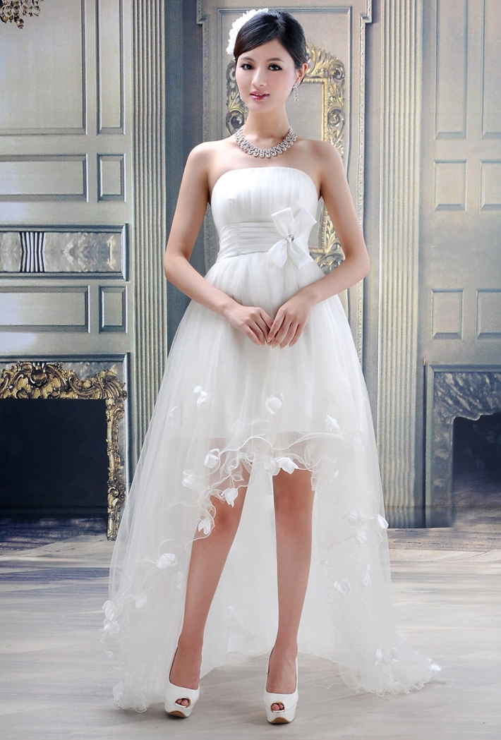 Asian Young Bride with Bare Legs wearing White Long Tulle Dress and Open Toe High Heels
